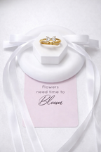 Open gold ring featuring a 9x5 mm bow design and a white zirconia inlay.
