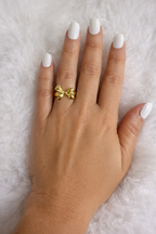 Cast stainless steel ring with a luxurious aesthetic, plated in 18k gold.