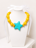 Ball and star necklace