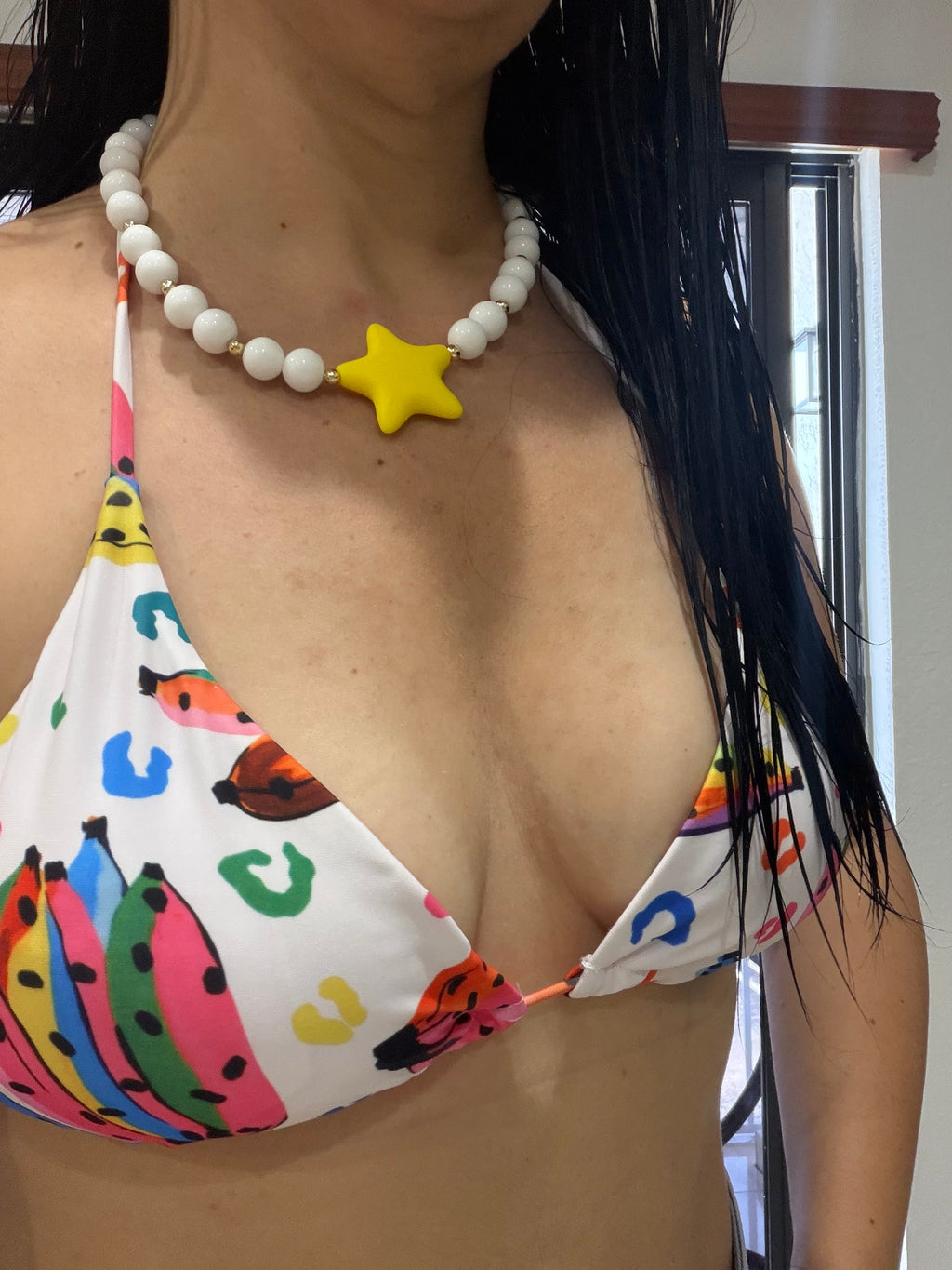 Ball and star necklace