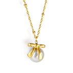 Bow + white pearl pendant necklace