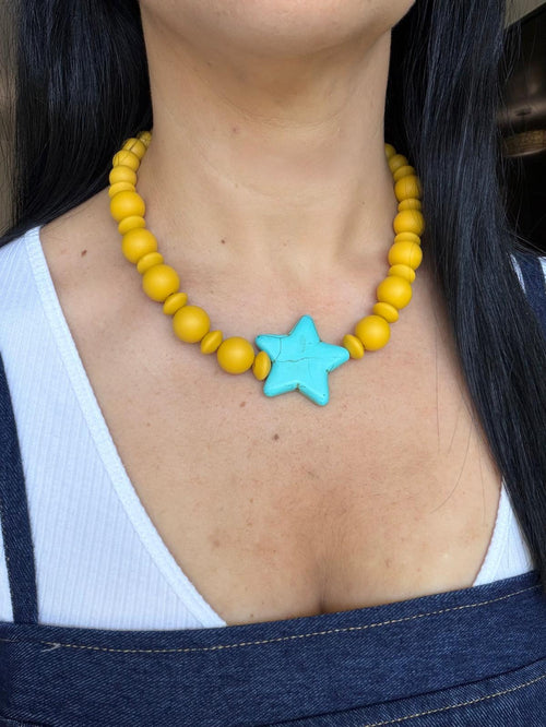 Ball and star necklace