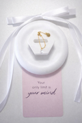Adjustable ring with a white stone and gold plating