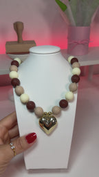 Ball and heart necklace
